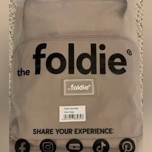 NWT Beige Foldie-40 L viral travel bag meets airline personal item specs!